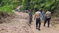 tanah-longsor-dairi Hujan deras yang terjadi di Kecamatan Silima Punggapungga, Kabupaten Dairi menyebabkan terjadinya bencana alam tanah longsor di Desa Lae Pangaroan.